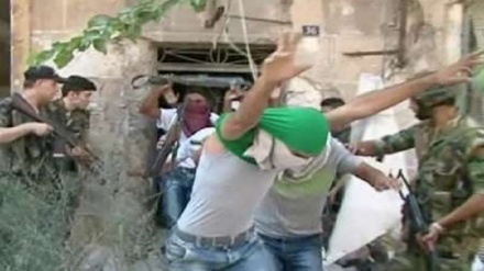 شام: حلب سے غیرمسلح جنگجوؤں کا انخلا شروع