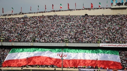 ایران اور چین کی فٹبال ٹیم کے مابین میچ کی تصویری جھلکیاں