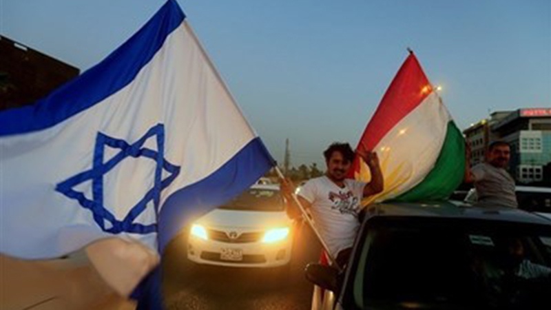 Sionist rejim bayrağı İraq Kürdüstanında referendum himayədarlarının əllərində

