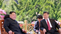 Susret Kim Džong Una, lidera Sjeverne Koreje, sa Ši Džin Pingom, predsjednikom Kine