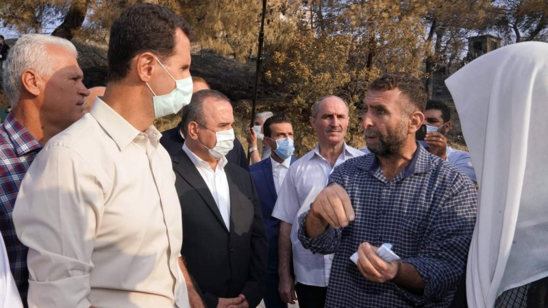 آتشزدگی کے بعد بشار اسد نے متاثرہ علاقے کا دورہ کیا