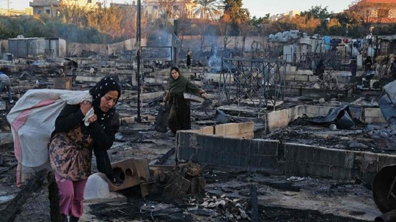 Hikûmeta Sûriyê şewitandina kampa penaberên Sûrî li Lubnanê şermezar kir 