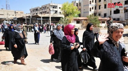 Hiljade Sirijaca se vraća kući nakon što su teroristi napustili njihov grad