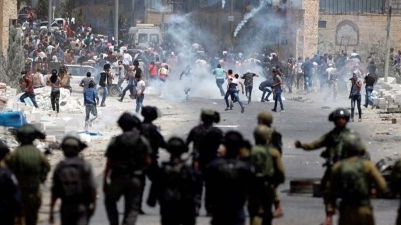 فلسطینیوں اور صیہنی فوجیوں میں جھڑپیں، دسیوں فلسطینی زخمی