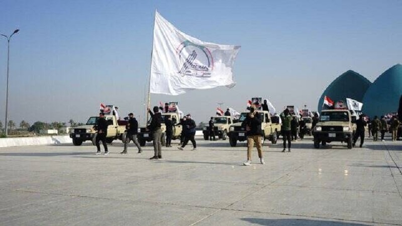 بەڕێکرانی هێمایی شەهیدانی حەشدی شەعبی لە عێراق، هێمای یەکڕیزیی عێراقییەکان دژی داگیرکەرانی ئەمریکایی