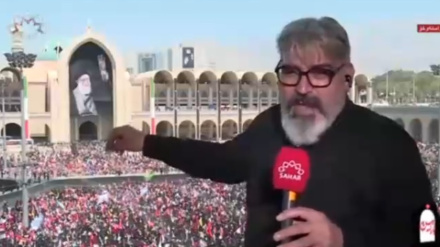کەریم ئەکبەرزادە باسی نووسراوەی سەر ئاڵا سوورەکان دەکات